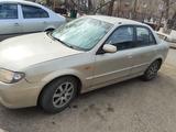 Mazda 323 2003 года за 2 100 000 тг. в Астана – фото 2