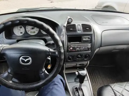 Mazda 323 2003 годаүшін2 100 000 тг. в Астана – фото 3