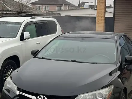 Toyota Camry 2015 года за 8 000 000 тг. в Атырау