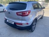 Kia Sportage 2012 года за 6 500 000 тг. в Жанаозен – фото 4