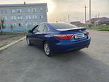 Toyota Camry 2015 года за 9 300 000 тг. в Атырау – фото 4