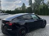 Tesla Model Y 2023 года за 17 000 000 тг. в Алматы