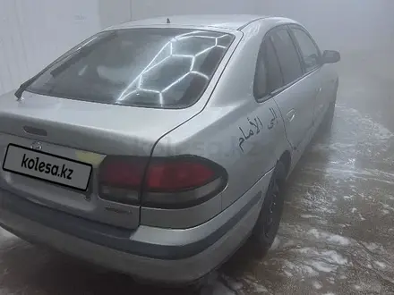 Mazda 626 1998 года за 2 000 000 тг. в Караганда – фото 6