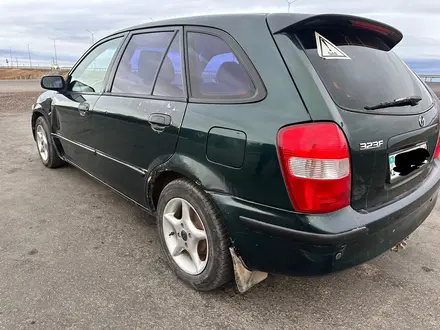 Mazda 323 1999 года за 1 100 000 тг. в Актобе – фото 5