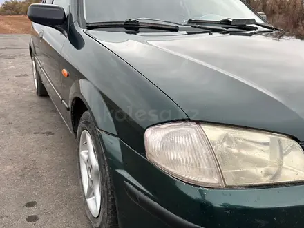 Mazda 323 1999 года за 1 100 000 тг. в Актобе – фото 9