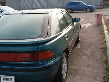 Mazda 323 1992 года за 400 000 тг. в Алматы – фото 4