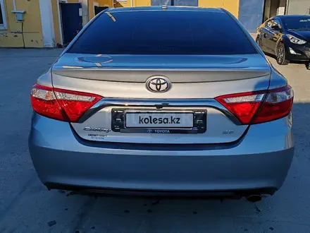 Toyota Camry 2017 года за 7 600 000 тг. в Атырау – фото 10