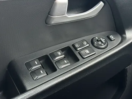 Kia Sportage 2012 года за 7 700 000 тг. в Актобе – фото 11