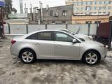 Chevrolet Cruze 2011 года за 4 000 000 тг. в Шымкент – фото 2