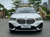 BMW X1 2023 года за 12 100 000 тг. в Алматы