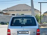Kia Carnival 2005 года за 1 900 000 тг. в Шымкент – фото 3