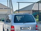 Kia Carnival 2005 года за 1 900 000 тг. в Шымкент – фото 4