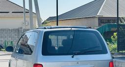 Kia Carnival 2005 года за 1 900 000 тг. в Шымкент – фото 4