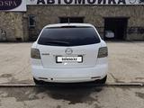 Mazda CX-7 2011 года за 4 500 000 тг. в Темир – фото 2