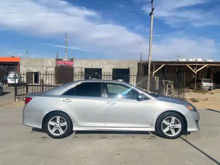 Toyota Camry 2014 года за 6 000 000 тг. в Жанаозен – фото 9