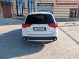 Mitsubishi Outlander 2015 года за 6 000 000 тг. в Жанаозен – фото 2