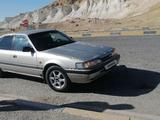 Mazda 626 1990 года за 750 000 тг. в Жанаозен – фото 2