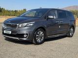 Kia Carnival 2014 года за 9 950 000 тг. в Текели – фото 2