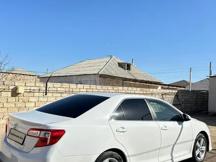 Toyota Camry 2014 года за 6 100 000 тг. в Жанаозен – фото 26