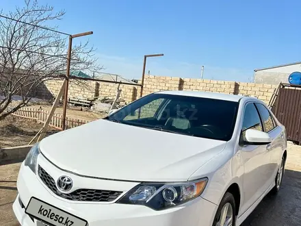 Toyota Camry 2014 года за 6 100 000 тг. в Жанаозен – фото 7