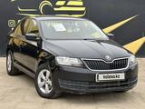 Skoda Rapid 2014 года за 4 150 000 тг. в Атырау – фото 2