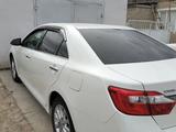 Toyota Camry 2014 года за 9 000 000 тг. в Уральск – фото 2