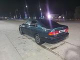 Toyota Carina E 1993 года за 1 850 000 тг. в Шолаккорган – фото 2