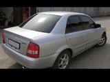 Mazda Familia 2002 года за 100 000 тг. в Астана