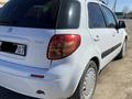 Suzuki SX4 2013 года за 4 000 000 тг. в Атырау – фото 2