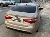 Kia Rio 2014 года за 2 800 000 тг. в Атырау – фото 3