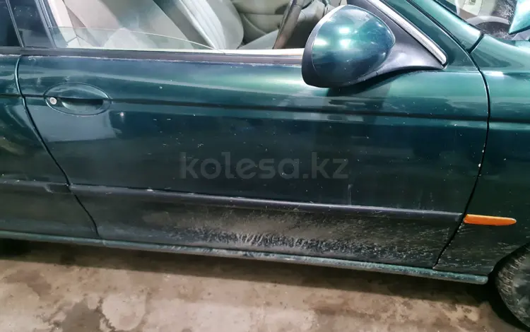 Двери ягуар x-type 2002г за 40 000 тг. в Актобе