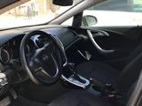 Opel Astra 2012 года за 2 600 000 тг. в Жанаозен – фото 4