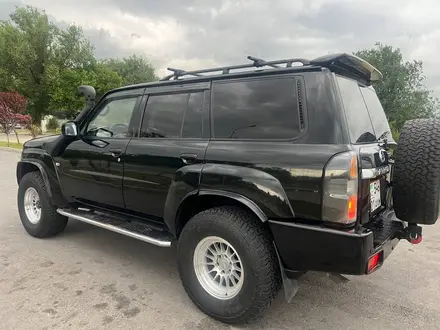 Nissan Patrol 2007 года за 19 500 000 тг. в Шымкент – фото 13