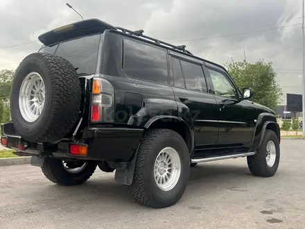 Nissan Patrol 2007 года за 19 500 000 тг. в Шымкент – фото 23