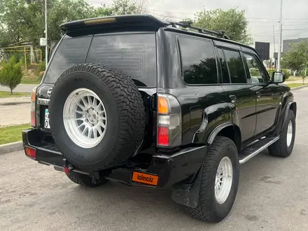 Nissan Patrol 2007 года за 19 500 000 тг. в Шымкент – фото 24