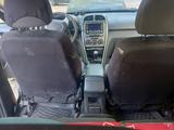 Chery Tiggo 2013 года за 2 000 000 тг. в Караганда – фото 2