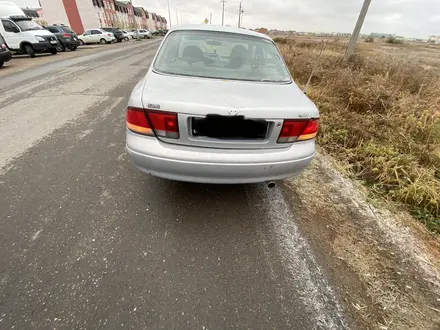 Mazda 626 1994 года за 800 000 тг. в Астана – фото 7