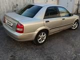 Mazda 323 2003 года за 1 300 000 тг. в Шымкент – фото 4