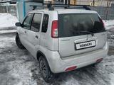 Suzuki Ignis 2001 года за 2 000 000 тг. в Есик – фото 4