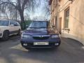 Mazda 626 1998 года за 2 900 000 тг. в Алматы – фото 13
