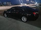 Toyota Camry 2014 года за 8 800 000 тг. в Атырау – фото 5