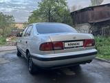 Toyota Carina E 1997 года за 1 500 000 тг. в Алматы – фото 5