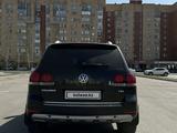 Volkswagen Touareg 2009 года за 4 800 000 тг. в Астана – фото 4