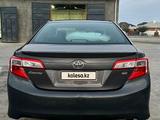 Toyota Camry 2012 года за 6 000 000 тг. в Жанаозен – фото 2