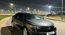 Toyota Camry 2014 годаүшін8 100 000 тг. в Караганда