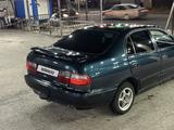 Toyota Carina 1997 года за 1 200 000 тг. в Шымкент – фото 2