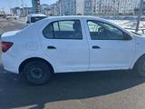 Renault Logan 2018 года за 2 500 000 тг. в Атырау – фото 3