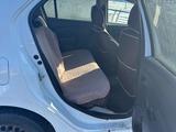 Renault Logan 2018 года за 2 500 000 тг. в Атырау – фото 5