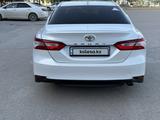 Toyota Camry 2018 года за 12 200 000 тг. в Жанаозен – фото 4