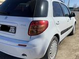 Suzuki SX4 2013 года за 3 800 000 тг. в Актобе – фото 3